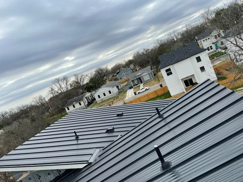 Standing seam metal roof panels with vents for Skylight Repair in Mont Belvieu